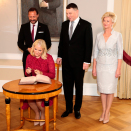 Crown Princess Mette-Marit signs the guest book. Photo: Lise Åserud / NTB scanpix